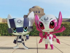 Олимпийн наадмын түүхэнд анх удаа бэлгэ тэмдгээр амьтан бус робот тодорсон