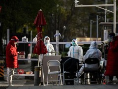 БНХАУ ковидыг хатуу дэглэмээ бууруулна 